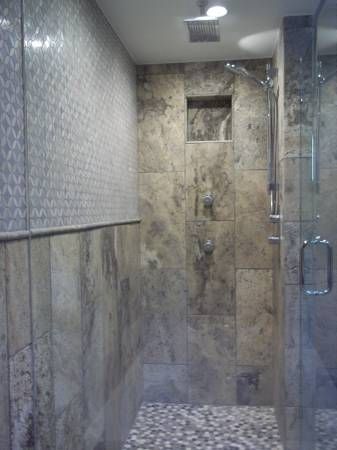 Matching travertine shower for one or two people with three shower functions