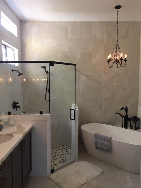 Master bathroom with 11 foot tall tiled walls
